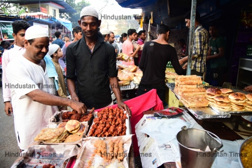 Indian Muslims Enjoy Iftar Delicacies In The Evening During Ramadan 