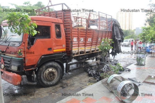 Tempo Carries The Cans Of Corrosive Liquid Topples In Thane