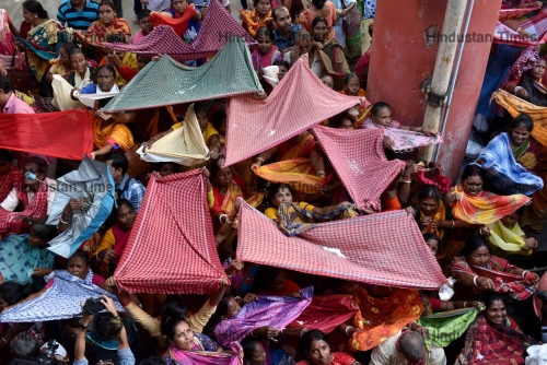 Devotees Gather To Collect Holy Rice As Offerings On The Occasion Of The 'Annakut' Or 'Govardhan Puja' Festival In Kolkata