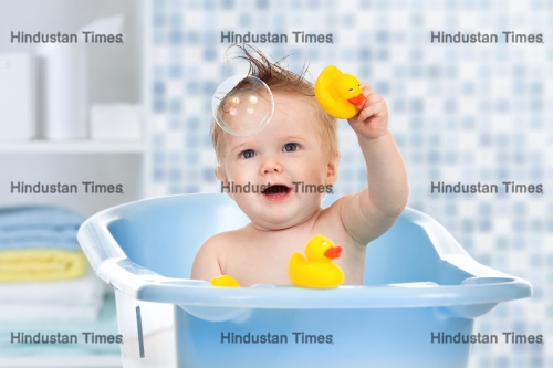 Baby,Infant,Taking,Bath,,Looking,Upwards,And,Playing