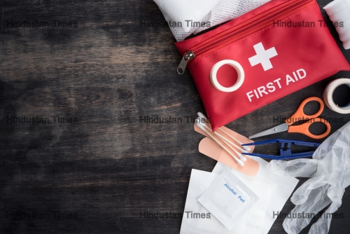First,Aid,Medical,Kit,On,Wood,Background,copy,Space,top,View