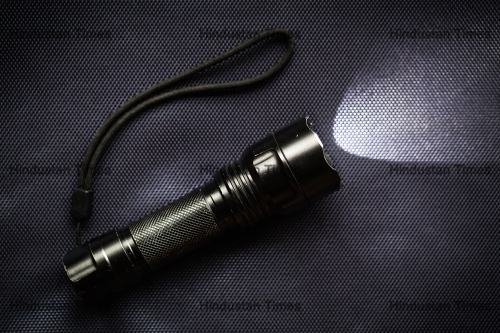 Led,Flashlight,With,A,Light,Beam,For,Hiking,At,Night