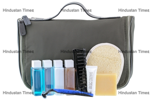 Black,Traveling,Cosmetic,Bag,With,Toiletries,In,The,Front,,Isolated