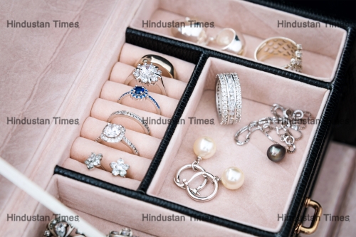 Jewelry,Box,With,White,Gold,And,Silver,Rings,,Earrings,And