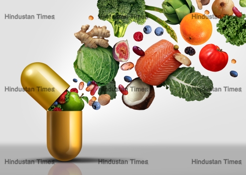 Vitamins,Supplements,As,A,Capsule,With,Fruit,Vegetables,Nuts,And