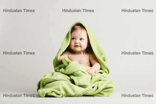 Cute,Baby,Girl,Covered,In,Green,Blanket.,Coziness.,Child,Care.