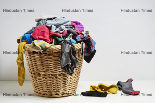 Overflowing,Laundry,Basket.,Household,Chore,Concept,On,White,Background