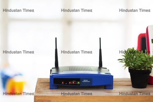 Closeup,Of,A,Wireless,Router,On,Living,Room,At,Home