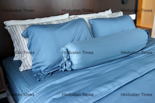 Closeup,Of,Pillows,And,Bolster,On,A,Modern,Bed