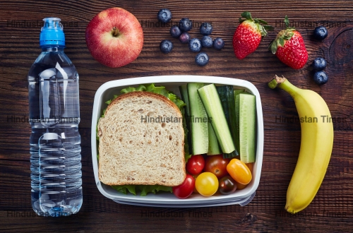 Healthy,Lunch,Box,With,Sandwich,And,Fresh,Vegetables,,Bottle,Of