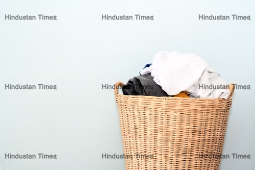 Overflowing,Laundry,Wicker,Basket.,Household,Chore,Concept,On,Gray,Background