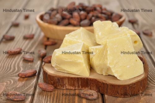 Natural,Cocoa,Butter,On,A,Brown,Background
