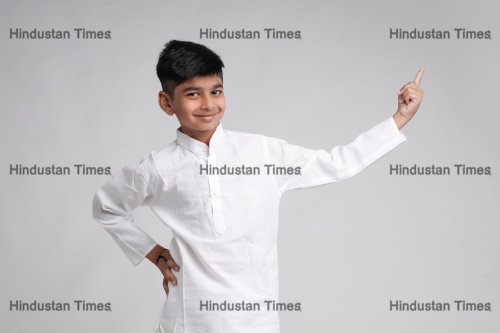 Cute,Indian,Little,Boy,In,Ethnic,Wear,And,Showing,Expression