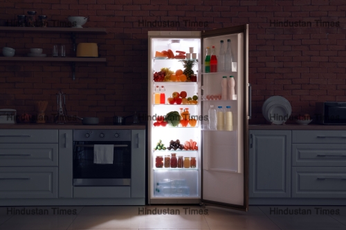 Open,Refrigerator,In,Dark,Modern,Kitchen