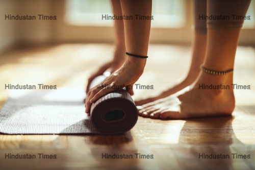 Close,Up,Of,A,Womans,Hands,Is,Rolling,Up,Exercise