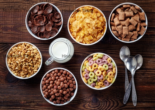 Bowls,Of,Various,Cereals,And,Milk,From,Top,View