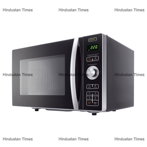 Microwave,Oven,Isolated,On,White,Background.,Side,View,Of,Stainless