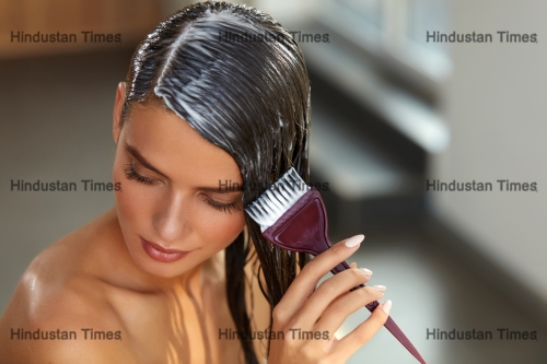 Hair,Masking.,Young,Woman,With,Brush,In,Hand,Applying,Natural