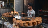 Indian Muslims Enjoy Iftar Delicacies In The Evening During Ramadan 