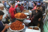 People Buy Food Items To Break A Day Long Fast During Iftar In A Holy Month Of Ramadan
