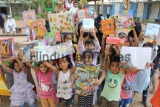 Children Get Reading Bug From ‘Suitcase’ Library At Mumbra