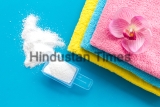 Laundry,Concept.,Clean,Linen,And,Orchid,Near,Washing,Powder,On