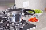 Double,Valve,Pressure,Cooker,,In,A,Kitchen,Setting
