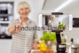 Selective,Focus,On,Modern,Smartphone,Against,Blurred,Background,With,Retirement