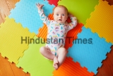 4,Months,Old,Baby,Girl,Lying,On,Colorful,Play,Mat