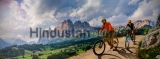 Couple,Cycling,On,Electric,Bike,,Rides,Mountain,Trail.,Woman,And