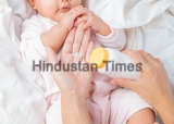 Mother,Preparing,Baby,Powder,In,Her,Hand,And,Four,Month