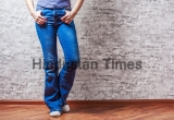 Woman,Fashion,Concept.,Female,Legs,In,Jeans,And,Sneakers,On
