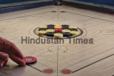 A,Game,Of,Carrom,With,Pieces,Carrom,Man,On,The