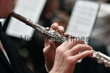 Close,Up,Tight,Shot,Of,Hand,Playing,Flute