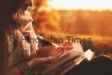 Beautiful,Girl,In,Autumn,Forest,Reading,A,Book,Covered,With