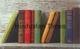 Old,Books,On,The,Background,Of,A,Wooden