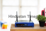 Closeup,Of,A,Wireless,Router,On,Living,Room,At,Home