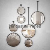Round,Mirrors,Hanging,On,The,Wall,Reflecting,Interior,Design,Scene,