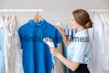 Woman,Steaming,Clothes,In,Modern,Dry-cleaner's