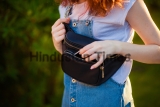 Red-haired,Girl,Pulls,Out,Of,Her,Waist,Bag
