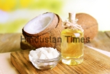 Coconut,Oil,On,Table,On,Light,Background