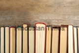 Collection,Of,Old,Books,On,Wooden,Background