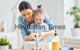 A,Cute,Little,Girl,And,Her,Mother,Are,Washing,Their