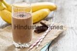 Chocolate,Banana,Smoothie,In,A,Glass,With,Straws