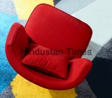 Top,View,Of,A,Red,Armchair,On,A,Colorful,Carpet