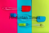 Silicone,Kitchen,Utensils,On,A,Tricolor,Background