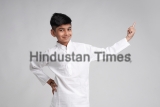 Cute,Indian,Little,Boy,In,Ethnic,Wear,And,Showing,Expression