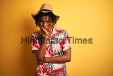 Afro,American,Man,With,Dreadlocks,Wearing,Floral,Shirt,And,Hat