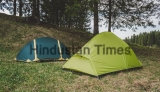 Green,Tents,In,A,Clearing,,Camping,In,The,Woods,,Adventure