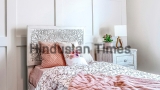 Pano,Single,Bed,And,Wooden,Side,Table,Inside,Relaxing,Bedroom